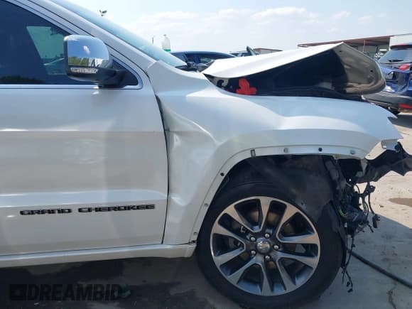 ✅ 2017 Jeep Grand Cherokee Overland • VIN: 1C4RJFCG1HC836961 • Lot: 43054609. Listed on IAAI with 133,975 mi. Free auction sales archive from the USA and detailed vehicle history report at DreamBid. Image 18.