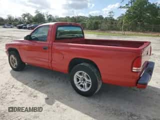 2002 Dodge Dakota Sport с VIN 1B7FL36X72S543943, выставлен на аукционе Copart как лот 80767984 с пробегом Не указан миль и Чистый • Clean title. История ставок и продаж доступна на DreamBid. Изображение 2.