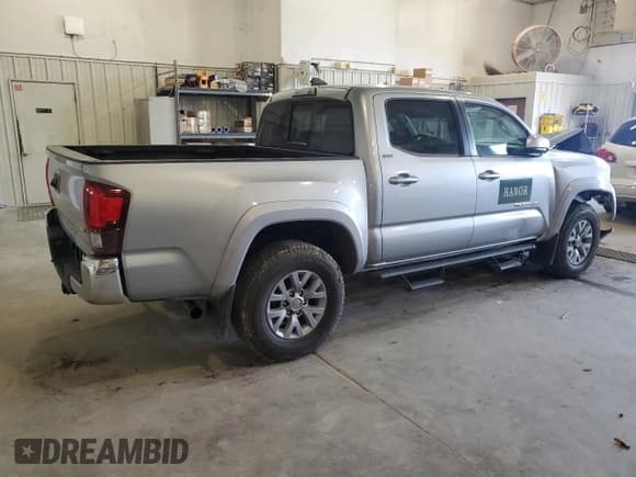 ✅ 2019 Toyota Tacoma SR5 • VIN: 3TMCZ5AN3KM264565 • Lot: 86321095. Listed on Copart with 105,230 mi. Free auction sales archive from the USA and detailed vehicle history report at DreamBid. Image 3.
