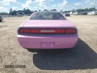 2012 Dodge Challenger SXT z VIN 2C3CDYAG7CH161977, wystawiony jako Copart lot #72713354 z przebiegiem 240 769 mil mil oraz Szkoda całkowita • Salvage title. Historia ofert i sprzedaży dostępna na DreamBid. Obrazek 6.