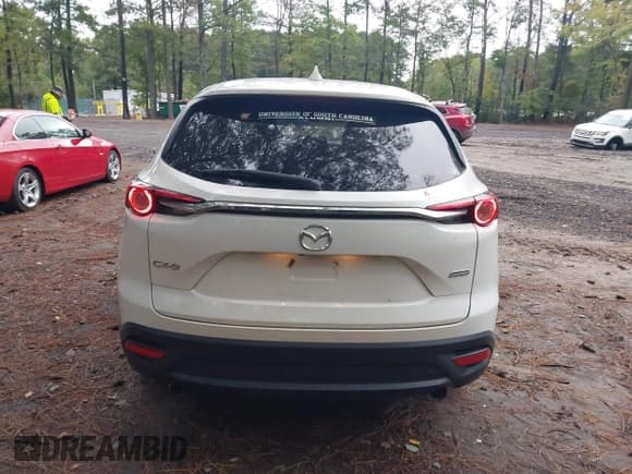 ✅ 2018 Mazda CX-9 Touring • VIN: JM3TCACY8J0210169 • Лот: 43439805. Опубликован ранее на IAAI с пробегом 92 795 миль. Бесплатный доступ к архиву аукционных продаж из США и подробный отчёт об истории автомобиля на DreamBid. Изображение 16.