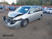 ✅ 2010 Toyota Sienna XLE • VIN: 5TDYK4CC4AS307955 • Lot: 43513288. Listed on IAAI with 156,519 mi. Free auction sales archive from the USA and detailed vehicle history report at DreamBid. Image 2.