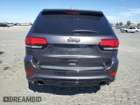 ✅ 2018 Jeep Grand Cherokee SRT • VIN: 1C4RJFDJ8JC488401 • Лот: 68311635. Опубликован ранее на Copart с пробегом 37 512 миль. Бесплатный доступ к архиву аукционных продаж из США и подробный отчёт об истории автомобиля на DreamBid. Изображение 6.