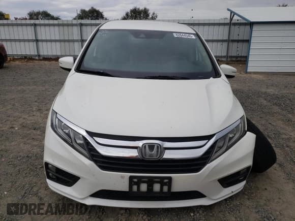 ✅ 2019 Honda Odyssey EX • VIN: 5FNRL6H52KB010910 • Lot: 82644545. Listed on Copart with 87,771 mi. Free auction sales archive from the USA and detailed vehicle history report at DreamBid. Image 5.