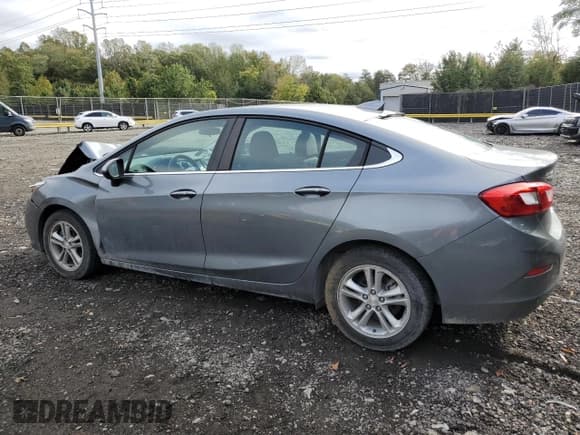 ✅ 2018 Chevrolet Cruze LT • VIN: 1G1BE5SM9J7142050 • Lot: 86644115. Listed on Copart with 94,262 mi. Free auction sales archive from the USA and detailed vehicle history report at DreamBid. Image 2.