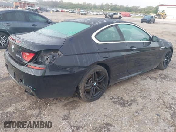 ✅ 2012 BMW 6 Series 650i xDrive • VIN: WBALX5C52CC894130 • Лот: 43309112. Опубликован ранее на IAAI с пробегом 97 370 миль. Бесплатный доступ к архиву аукционных продаж из США и подробный отчёт об истории автомобиля на DreamBid. Изображение 4.