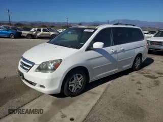 ✅ 2007 Honda Odyssey EX-L • VIN: 5FNRL38747B424584 • Lot: 91726225. Listed on Copart with 217,982 mi. Free auction sales archive from the USA and detailed vehicle history report at DreamBid. Image 1.