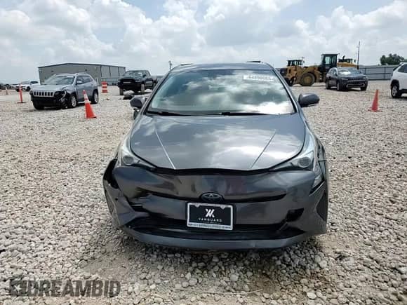 2017 Toyota Prius Two с VIN JTDKARFU9H3050202, выставлен на аукционе Copart как лот 64890065 с пробегом 82 789 миль миль и Списание • Salvage title. История ставок и продаж доступна на DreamBid. Изображение 13.