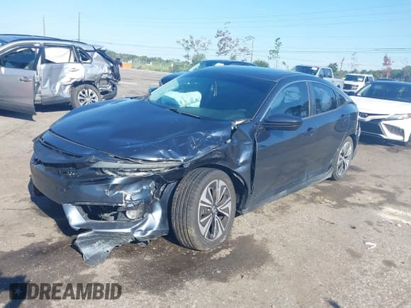 ✅ 2017 Honda Civic EX-T • VIN: 19XFC1F3XHE022115 • Lot: 43224072. Listed on IAAI with 157,871 mi. Free auction sales archive from the USA and detailed vehicle history report at DreamBid. Image 17.
