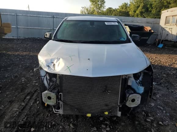 2018 Chevrolet Traverse LS with VIN 1GNEVFKW6JJ199862, listed as a Copart auction lot 69984765 with 74,949 mi miles and Salvage title. Bid and sale history available at DreamBid. Image 5.