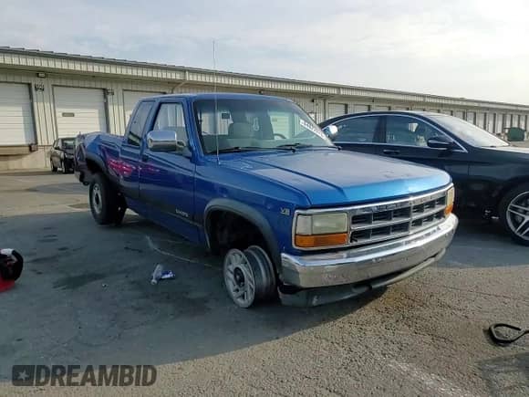 1992 Dodge Dakota with VIN 1B7GL23Y6NS585763, listed as a Copart auction lot 64827975 with 245,063 mi miles and Salvage title. Bid and sale history available at DreamBid. Image 14.
