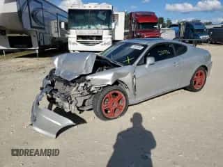 2006 Hyundai Tiburon GT z VIN KMHHN65F96U224661, wystawiony jako Copart lot #76643653 z przebiegiem 200 436 mil mil oraz Szkoda całkowita • Salvage title. Historia ofert i sprzedaży dostępna na DreamBid. Obrazek 1.