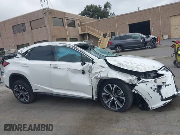 ✅ 2019 Lexus RX 450h • VIN: 2T2BGMCA8KC041271 • Lot: 42582468. Wystawiony na IAAI z przebiegiem 85 477 mil. Bezpłatny archiwum sprzedaży aukcyjnych z USA i szczegółowy raport historii pojazdu na DreamBid. Zdjęcie 14.