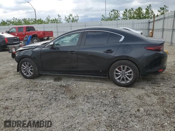 ✅ 2020 Mazda 3 • VIN: 3MZBPAB78LM138338 • Лот: 57143365. Опубликован ранее на Copart с пробегом 113 570 миль. Бесплатный доступ к архиву аукционных продаж из США и подробный отчёт об истории автомобиля на DreamBid. Изображение 2.