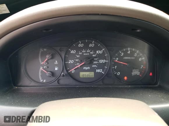✅ 2003 Mazda Protege DX • VIN: JM1BJ226730103729 • Lot: 63227285. Listed on Copart with 185,866 mi. Free auction sales archive from the USA and detailed vehicle history report at DreamBid. Image 9.