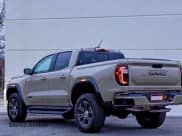 ✅ 2024 GMC Canyon 4WD AT4 • VIN: 1GTP6DEK4R1238861 • Lot: 96228215. Listed on Copart with 9,056 mi. Free auction sales archive from the USA and detailed vehicle history report at DreamBid. Image 3.