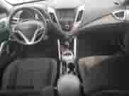 2017 Hyundai Veloster с VIN KMHTC6AD4HU312749, выставлен на аукционе Copart как лот 71572074 с пробегом 129 765 миль миль и Списание • Salvage title. История ставок и продаж доступна на DreamBid. Изображение 8.