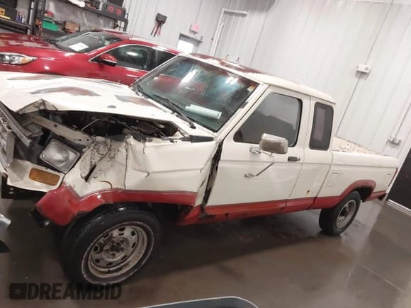 ✅ 1988 Ford Ranger • VIN: 1FTCR15TXJPB78342 • Lot: 41696081. Listed on IAAI with 14,333 mi. Free auction sales archive from the USA and detailed vehicle history report at DreamBid. Image 15.