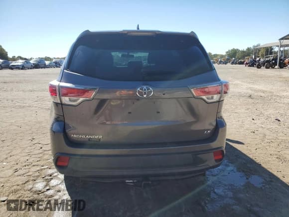 ✅ 2016 Toyota Highlander LE • VIN: 5TDZKRFH9GS128876 • Lot: 86712865. Listed on Copart with 112,779 mi. Free auction sales archive from the USA and detailed vehicle history report at DreamBid. Image 6.