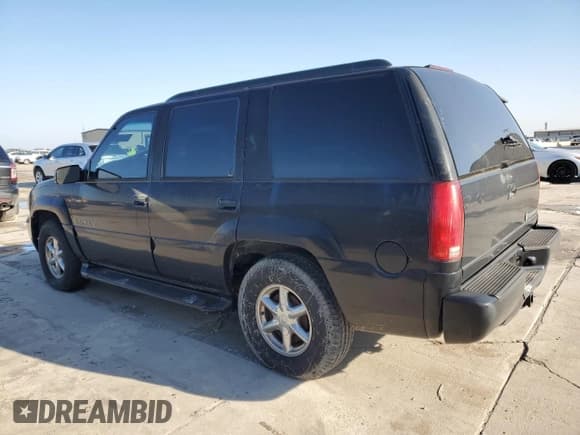 ✅ 1999 Cadillac Escalade • VIN: 1GYEK13R7XR402243 • Lot: 43269935. Listed on Copart with 231,465 mi. Free auction sales archive from the USA and detailed vehicle history report at DreamBid. Image 2.