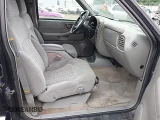 ✅ 1998 Chevrolet Blazer LS • VIN: 1GNDT13W9W2289009 • Lot: 42533871. Wystawiony na IAAI z przebiegiem 165 585 mil. Bezpłatny archiwum sprzedaży aukcyjnych z USA i szczegółowy raport historii pojazdu na DreamBid. Zdjęcie 5.