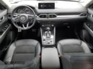 ✅ 2021 Mazda CX-5 Carbon Edition • VIN: JM3KFBCM2M0495767 • Лот: 63180775. Опубликован ранее на Copart с пробегом 42 167 миль. Бесплатный доступ к архиву аукционных продаж из США и подробный отчёт об истории автомобиля на DreamBid. Изображение 8.