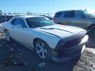 ✅ 2014 Dodge Challenger SXT • VIN: 2C3CDYAG0EH101929 • Lot: 41297567. Wystawiony na IAAI z przebiegiem 117 413 mil. Bezpłatny archiwum sprzedaży aukcyjnych z USA i szczegółowy raport historii pojazdu na DreamBid. Zdjęcie 1.