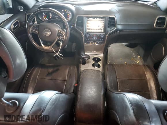 ✅ 2014 Jeep Grand Cherokee • VIN: 1C4RJEJM8EC424373 • Lot: 72256674. Listed on Copart with 128,998 mi. Free auction sales archive from the USA and detailed vehicle history report at DreamBid. Image 8.