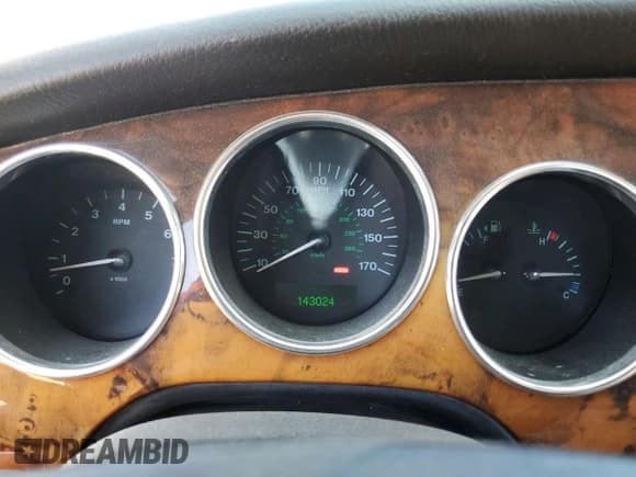 ✅ 2005 Jaguar XK XK8 • VIN: SAJDA42C452A41017 • Лот: 65583134. Опубликован ранее на Copart с пробегом 143 024 миль. Бесплатный доступ к архиву аукционных продаж из США и подробный отчёт об истории автомобиля на DreamBid. Изображение 9.