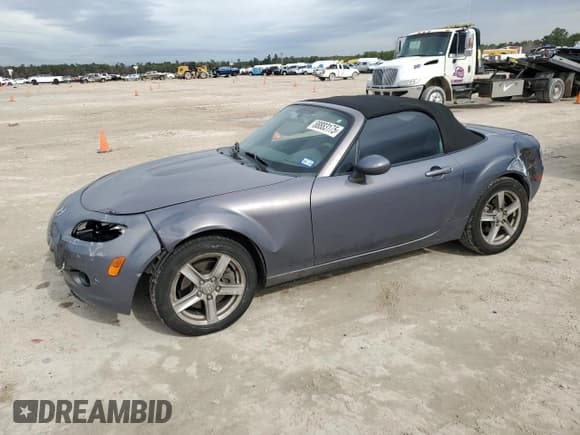 ✅ 2007 Mazda MX-5 Miata Sport • VIN: JM1NC25F170133320 • Лот: 88883175. Опубликован ранее на Copart с пробегом 140 411 миль. Бесплатный доступ к архиву аукционных продаж из США и подробный отчёт об истории автомобиля на DreamBid. Изображение 1.