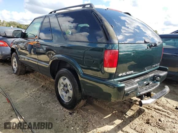 2002 Chevrolet Blazer LS z VIN 1GNCT18W52K187799, wystawiony jako Copart lot #73642634 z przebiegiem Nie podano mil oraz Szkoda całkowita • Salvage title. Historia ofert i sprzedaży dostępna na DreamBid. Obrazek 2.