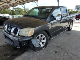 ✅ 2004 Nissan Titan LE • VIN: 1N6AA07A24N524160 • Лот: 82273295. Опубликован ранее на Copart с пробегом 263 591 миль. Бесплатный доступ к архиву аукционных продаж из США и подробный отчёт об истории автомобиля на DreamBid. Изображение 1.