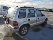 ✅ 1997 Kia Sportage • VIN: KNDJA7235V5538866 • Lot: 79728424. Wystawiony na Copart z przebiegiem 117 230 mil. Bezpłatny archiwum sprzedaży aukcyjnych z USA i szczegółowy raport historii pojazdu na DreamBid. Zdjęcie 3.