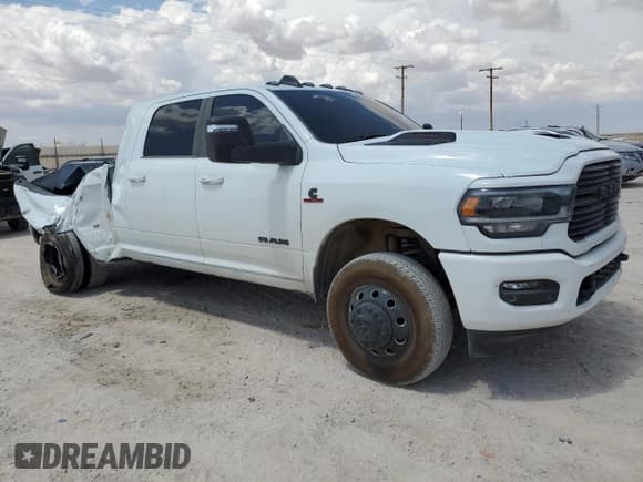 ✅ 2024 Ram 3500 Laramie • VIN: 3C63RRML0RG229435 • Lot: 80484814. Listed on Copart with 23,721 mi. Free auction sales archive from the USA and detailed vehicle history report at DreamBid. Image 4.