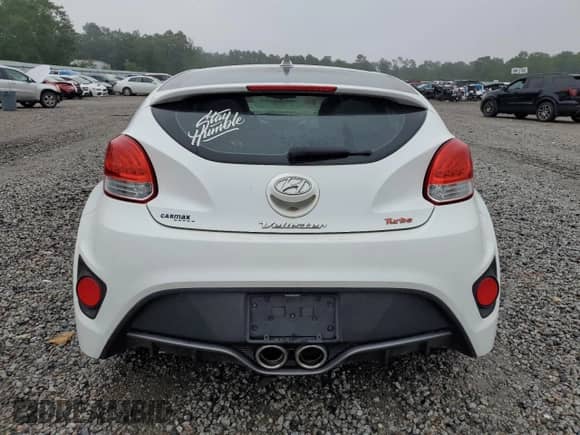 2013 Hyundai Veloster Turbo with VIN KMHTC6AE6DU164249, listed as a Copart auction lot 58112205 with 104,679 mi miles and Clean title. Bid and sale history available at DreamBid. Image 6.