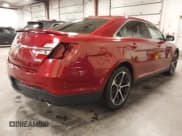 ✅ 2014 Ford Taurus SHO • VIN: 1FAHP2KT9EG130834 • Lot: 41748199. Listed on IAAI with 98,857 mi. Free auction sales archive from the USA and detailed vehicle history report at DreamBid. Image 4.