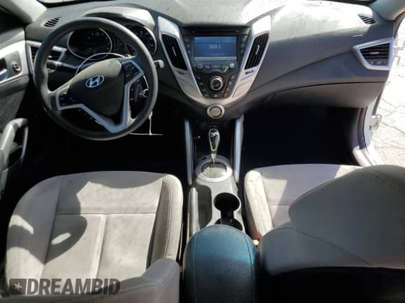 2014 Hyundai Veloster с VIN KMHTC6AD1EU215147, выставлен на аукционе Copart как лот 73018944 с пробегом 108 433 миль миль и Списание • Salvage title. История ставок и продаж доступна на DreamBid. Изображение 8.