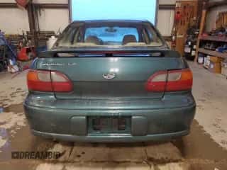 2000 Chevrolet Malibu LS z VIN 1G1NE52J9Y6223472, wystawiony jako Copart lot #84031724 z przebiegiem 230 453 mil mil oraz Czysty tytuł • Clean title. Historia ofert i sprzedaży dostępna na DreamBid. Obrazek 6.