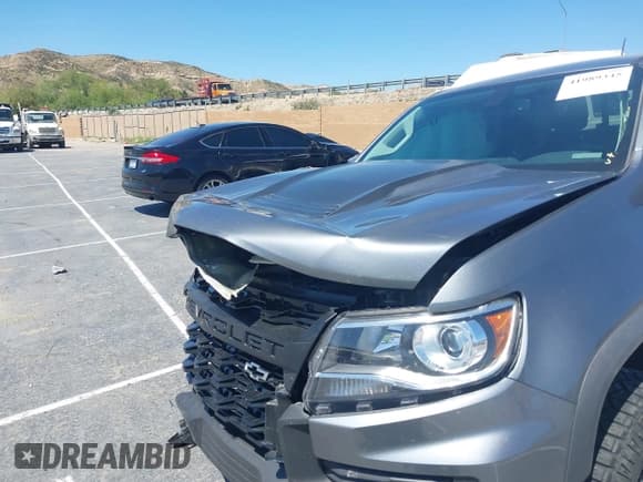 ✅ 2022 Chevrolet Colorado 4WD ZR2 • VIN: 1GCGTEEN3N1309342 • Лот: 41989345. Опубликован ранее на IAAI с пробегом 34 531 миль. Бесплатный доступ к архиву аукционных продаж из США и подробный отчёт об истории автомобиля на DreamBid. Изображение 6.