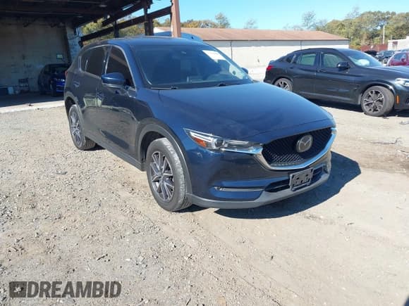 ✅ 2018 Mazda CX-5 Grand Touring • VIN: JM3KFBDM6J0473734 • Лот: 43536049. Опубликован ранее на IAAI с пробегом 124 488 миль. Бесплатный доступ к архиву аукционных продаж из США и подробный отчёт об истории автомобиля на DreamBid. Изображение 1.