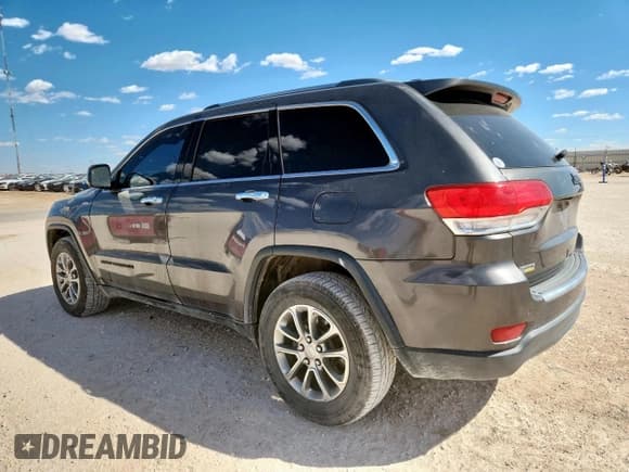 ✅ 2015 Jeep Grand Cherokee Limited • VIN: 1C4RJEBG4FC217909 • Лот: 81667135. Опубликован ранее на Copart с пробегом 133 030 миль. Бесплатный доступ к архиву аукционных продаж из США и подробный отчёт об истории автомобиля на DreamBid. Изображение 2.