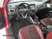 2012 Hyundai Veloster w/Red Int z VIN KMHTC6AD4CU077956, wystawiony jako Copart lot #43504505 z przebiegiem 103 183 mil mil oraz Szkoda całkowita • Salvage title. Historia ofert i sprzedaży dostępna na DreamBid. Obrazek 8.
