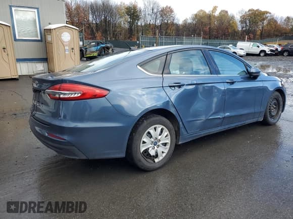 ✅ 2019 Ford Fusion S • VIN: 3FA6P0G77KR129242 • Лот: 90438905. Опубликован ранее на Copart с пробегом 71 785 миль. Бесплатный доступ к архиву аукционных продаж из США и подробный отчёт об истории автомобиля на DreamBid. Изображение 3.