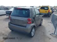 ✅ 2009 Smart fortwo Pure • VIN: WMEEJ31XX9K266564 • Lot: 41756278. Wystawiony na IAAI z przebiegiem 115 882 mil. Bezpłatny archiwum sprzedaży aukcyjnych z USA i szczegółowy raport historii pojazdu na DreamBid. Zdjęcie 4.