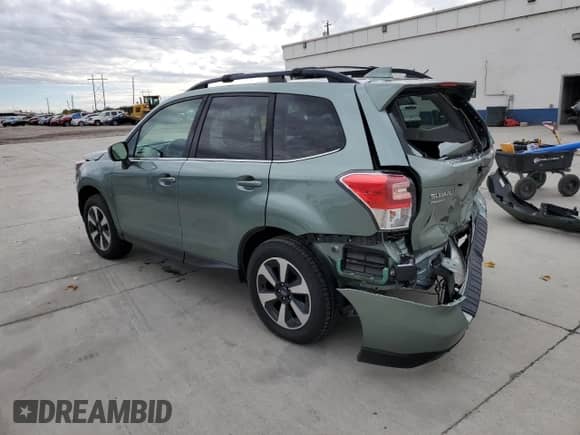 2018 Subaru Forester Limited with VIN JF2SJARC8JH586461, listed as a Copart auction lot 86336885 with 65,237 mi miles and Salvage title. Bid and sale history available at DreamBid. Image 2.
