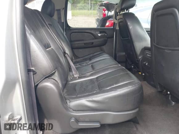 2014 Chevrolet Suburban LT z VIN 1GNSCJE0XER203597, wystawiony jako IAAI lot #42215407 z przebiegiem 186 556 mil mil oraz . Historia ofert i sprzedaży dostępna na DreamBid. Obrazek 8.