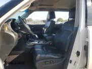 ✅ 2011 Infiniti QX56 8-passenger • VIN: JN8AZ2ND6B9700688 • Lot: 67642595. Listed on Copart with 144,419 mi. Free auction sales archive from the USA and detailed vehicle history report at DreamBid. Image 7.