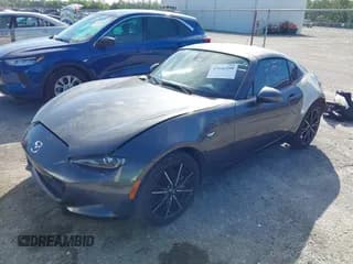 ✅ 2024 Mazda MX-5 Miata Grand Touring • VIN: JM1NDAM78R0608840 • Lot: 43646398. Listed on IAAI with 5,973 mi. Free auction sales archive from the USA and detailed vehicle history report at DreamBid. Image 2.