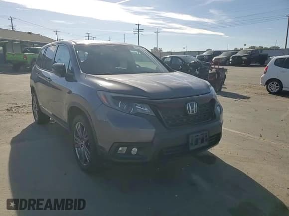 ✅ 2021 Honda Passport EX-L • VIN: 5FNYF8H58MB026336 • Lot: 89827295. Wystawiony na Copart z przebiegiem 89 955 mil. Bezpłatny archiwum sprzedaży aukcyjnych z USA i szczegółowy raport historii pojazdu na DreamBid. Zdjęcie 15.