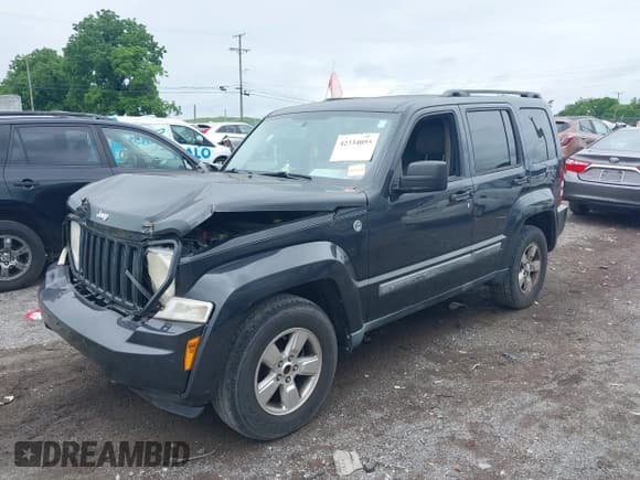 ✅ 2011 Jeep Liberty Sport Jet • VIN: 1J4PN2GK2BW577190 • Lot: 42334055. Listed on IAAI with 178,065 mi. Free auction sales archive from the USA and detailed vehicle history report at DreamBid. Image 2.